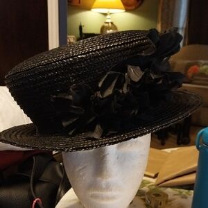 Elegant Black Straw Hat with Floral Accent